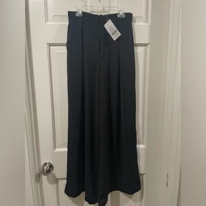 Tronjori Black wide leg dress pants. NWT never worn